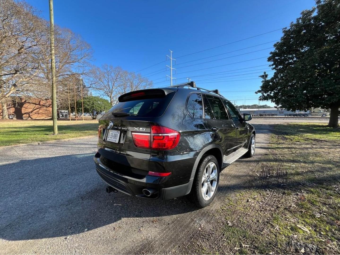 2011 Black /Tan BMW X5 xDrive 35D (5UXZW0C50BL) with an 3.0 M57 Diesel engine, Automatic transmission, located at 5700 Curlew Drive, Norfolk, VA, 23502, (757) 455-6330, 36.841885, -76.209412 - Photo#6